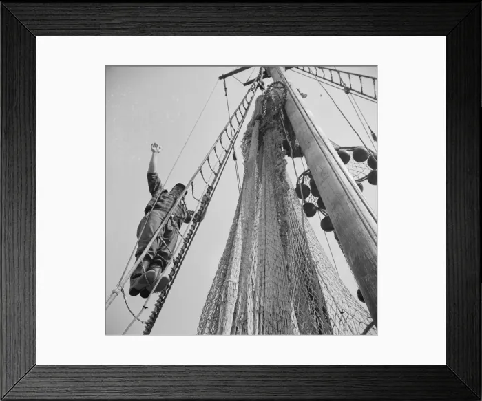 Framed Print : Gloucester fisherman standing in the rigging of a New England fishing boat, New York, 1943. Creator: Gordon Parks Framed Print : Gloucester fisherman standing in the rigging of a New England fishing boat, New York, 1943. Creator: Gordon Parks