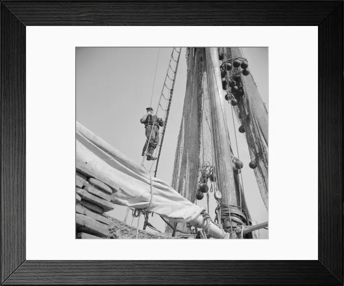 Framed Print : Gloucester fisherman standing in the rigging of a New England fishing boat, New York, 1943. Creator: Gordon Parks Framed Print : Gloucester fisherman standing in the rigging of a New England fishing boat, New York, 1943. Creator: Gordon Parks