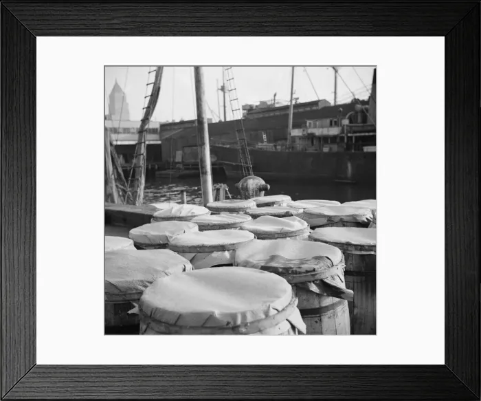 Framed Print : Barrels of fish on the docks at the Fulton fish market ready to be shipped to... New York, 1943. Creator: Gordon Parks Framed Print : Barrels of fish on the docks at the Fulton fish market ready to be shipped to... New York, 1943. Creator: Gordon Parks
