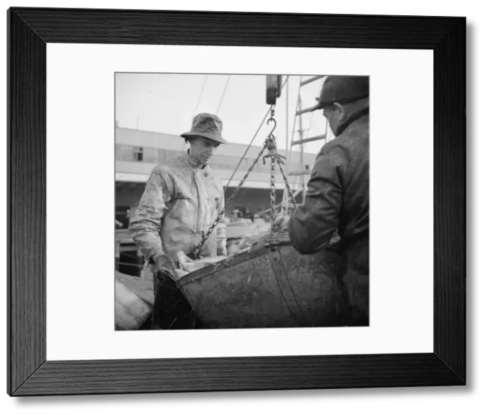 Framed Print : Possibly: New England fishermen unloading fish at the Fulton fish market, New York, 1943. Creator: Gordon Parks Framed Print : Possibly: New England fishermen unloading fish at the Fulton fish market, New York, 1943. Creator: Gordon Parks