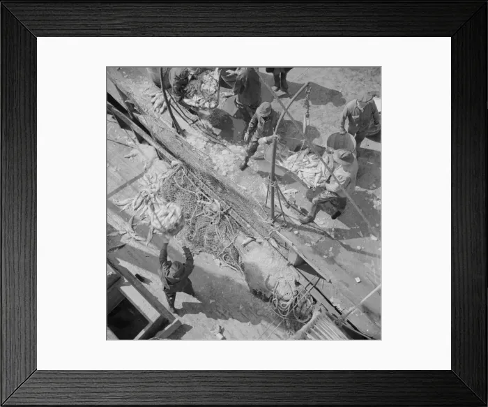 Framed Print : Fulton fish market dock stevedores unloading and weighing fish in the early morning, New York, 1943. Creator: Gordon Parks Framed Print : Fulton fish market dock stevedores unloading and weighing fish in the early morning, New York, 1943. Creator: Gordon Parks