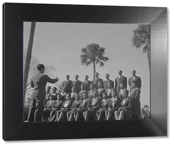 Bethune-Cookman College. Student choir singing on the campus, Daytona Beach, Florida, 1943. Creator: Gordon Parks