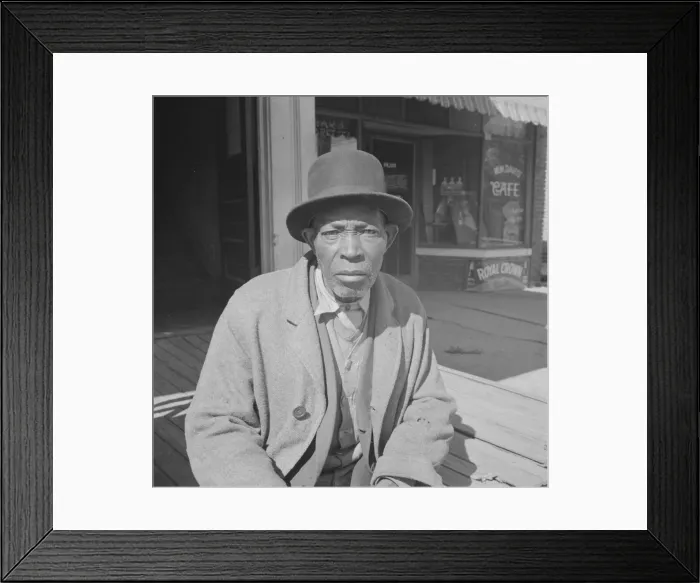 Framed Print : Men sitting in the sun on Sunday morning, Daytona Beach, Florida, 1943. Creator: Gordon Parks Framed Print : Men sitting in the sun on Sunday morning, Daytona Beach, Florida, 1943. Creator: Gordon Parks