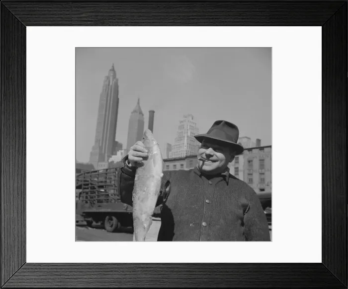 Framed Print : Fisherman holding a large catch at the Fulton fish market, New York, 1943. Creator: Gordon Parks Framed Print : Fisherman holding a large catch at the Fulton fish market, New York, 1943. Creator: Gordon Parks