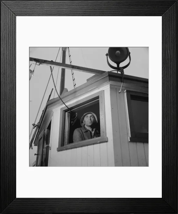 Framed Print : Gloucester, Massachusetts. Lorenzo Scola maneuvers ship during mackerel chase, 1943. Creator: Gordon Parks Framed Print : Gloucester, Massachusetts. Lorenzo Scola maneuvers ship during mackerel chase, 1943. Creator: Gordon Parks
