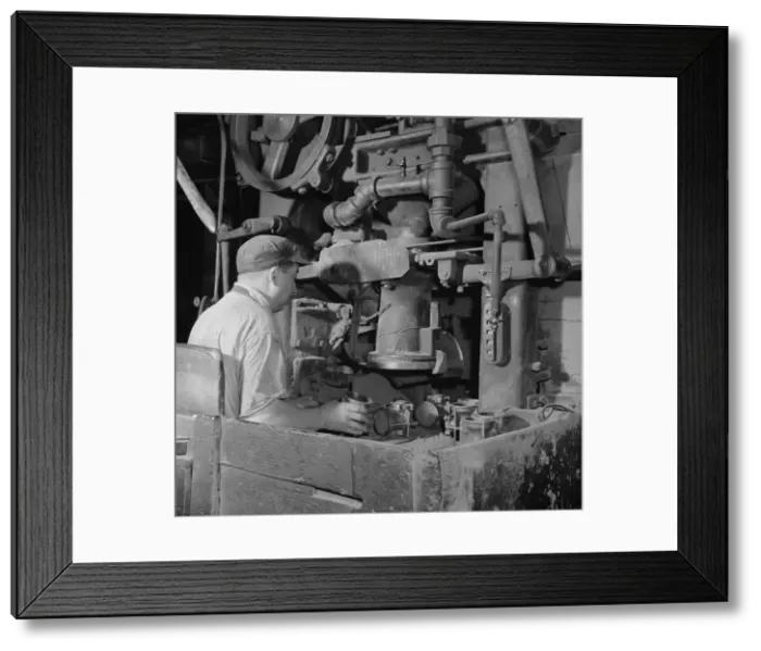 Framed Print : A core blowing machine, New Britain, Connecticut, 1943. Creator: Gordon Parks Framed Print : A core blowing machine, New Britain, Connecticut, 1943. Creator: Gordon Parks