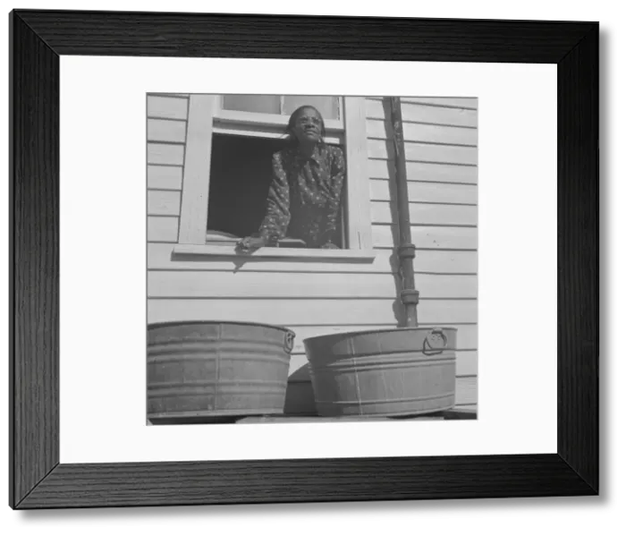 Framed Print : Woman who takes in laundry for a living, Daytona Beach, Florida, 1943. Creator: Gordon Parks Framed Print : Woman who takes in laundry for a living, Daytona Beach, Florida, 1943. Creator: Gordon Parks