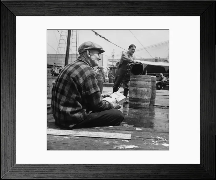 Framed Print : New England fisherman checking baskets of fish as they are lifted from his ship, New York, 1943. Creator: Gordon Parks Framed Print : New England fisherman checking baskets of fish as they are lifted from his ship, New York, 1943. Creator: Gordon Parks