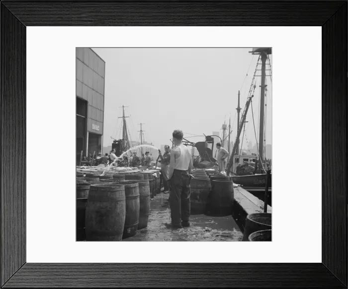 Framed Print : Watering fish at the Fulton fish market with brine water, New York, 1943. Creator: Gordon Parks Framed Print : Watering fish at the Fulton fish market with brine water, New York, 1943. Creator: Gordon Parks