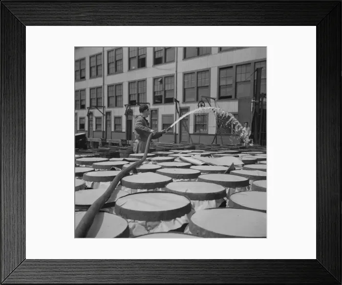 Framed Print : Watering fish at the Fulton fish market with brine water, New York, 1943. Creator: Gordon Parks Framed Print : Watering fish at the Fulton fish market with brine water, New York, 1943. Creator: Gordon Parks