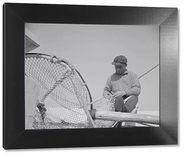 Frank Mineo, owner and skipper of the New England fishing boat... Gloucester, Massachusetts, 1943. Creator: Gordon Parks