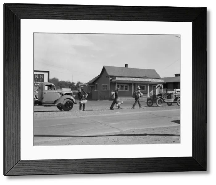 Framed Print : Single itinerant men on way to railroad yard, near Toppenish, Yakima Valley, Washington, 1939. Creator: Dorothea Lange Framed Print : Single itinerant men on way to railroad yard, near Toppenish, Yakima Valley, Washington, 1939. Creator: Dorothea Lange