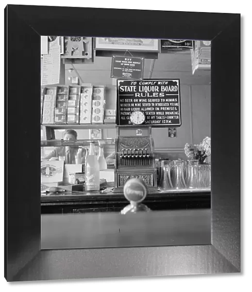 Across the counter is Ghost Town Cafe, Vader, Lewis County, Western Washington, 1939. Creator: Dorothea Lange