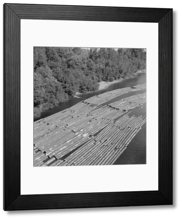Framed Print : Log rafts on the Williamette River between Salem and Independence, Oregon, 1939. Creator: Dorothea Lange