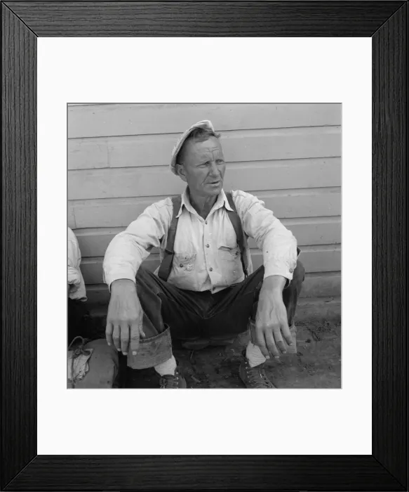 Framed Print : Bindle stiff, used to be logger, Side of Pastime Cafe, Tulelake, Siskiyou County, California, 1939. Creator: Dorothea Lange