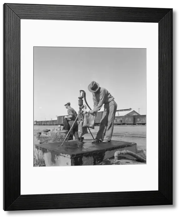 Framed Print : Drinking water for the whole town, also for the... Tulelake, Siskiyou County, California, 1939. Creator: Dorothea Lange Framed Print : Drinking water for the whole town, also for the... Tulelake, Siskiyou County, California, 1939. Creator: Dorothea Lange