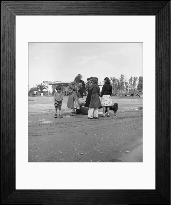 Framed Print : Family of homeless, walking people are left at the edge of the next town, 1939. Creator: Dorothea Lange Framed Print : Family of homeless, walking people are left at the edge of the next town, 1939. Creator: Dorothea Lange
