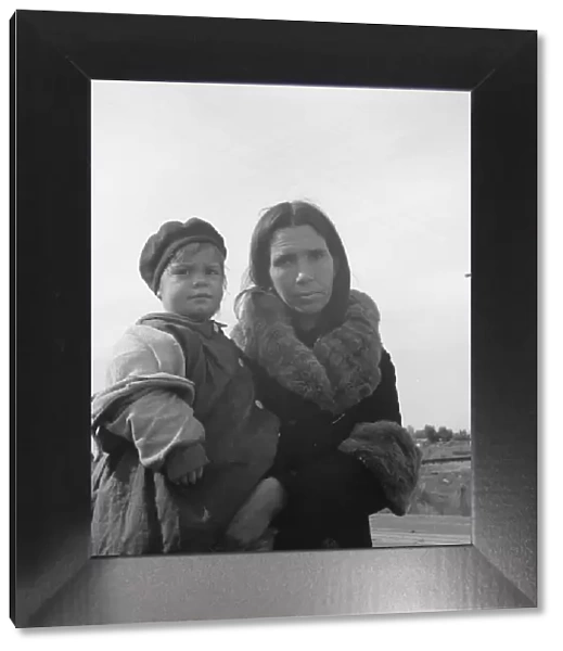 Homeless mother and youngest child of seven... US99, near Brawley, Imperial County, 1939. Creator: Dorothea Lange