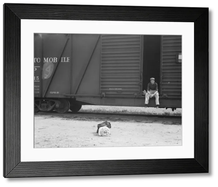 Framed Print : Car on siding across tracks from pea packing plant, Calipatria, Imperial Valley, 1939. Creator: Dorothea Lange Framed Print : Car on siding across tracks from pea packing plant, Calipatria, Imperial Valley, 1939. Creator: Dorothea Lange