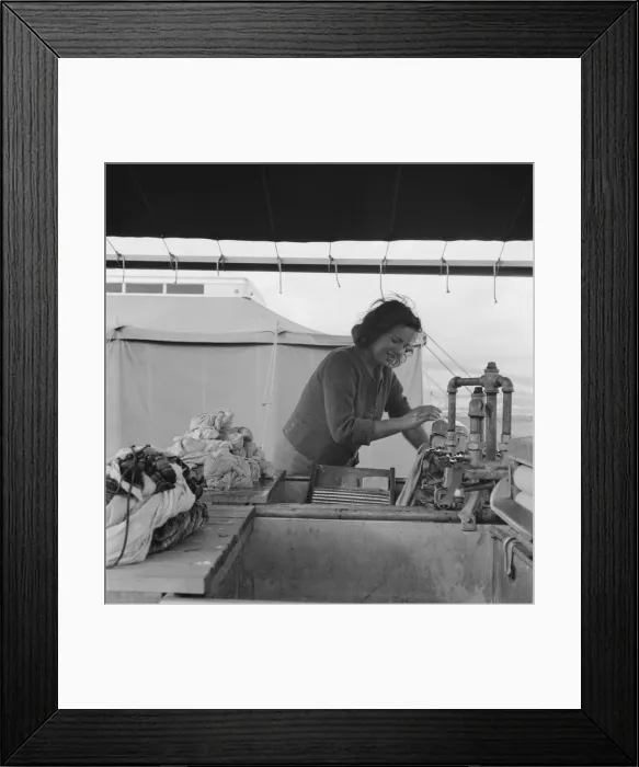 Framed Print : Young migrant girl makes use of facilities... Merrill FSA camp, Klamath County, Oregon, 1939. Creator: Dorothea Lange Framed Print : Young migrant girl makes use of facilities... Merrill FSA camp, Klamath County, Oregon, 1939. Creator: Dorothea Lange