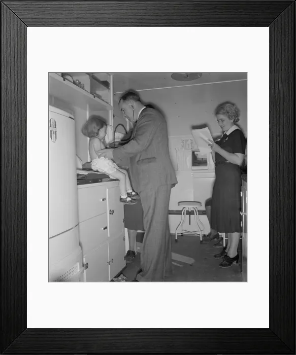 Framed Print : Doctor examining children in trailer clinic, FSA mobile camp, Klamath County, Oregon, 1939 Creator: Dorothea Lange Framed Print : Doctor examining children in trailer clinic, FSA mobile camp, Klamath County, Oregon, 1939 Creator: Dorothea Lange