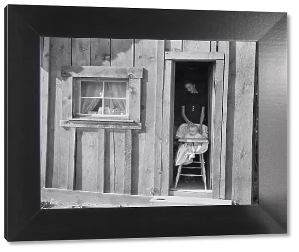 Wife and baby of president of Ola self-help sawmill co-op... Gem County, Idaho, 1939. Creator: Dorothea Lange