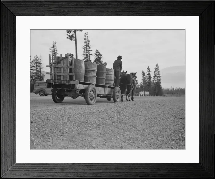 Framed Print : Farmer and his boy hauling water for drinking and domestic purposes... Boundary County, Idaho, 1939 Creator: Dorothea Lange Framed Print : Farmer and his boy hauling water for drinking and domestic purposes... Boundary County, Idaho, 1939 Creator: Dorothea Lange