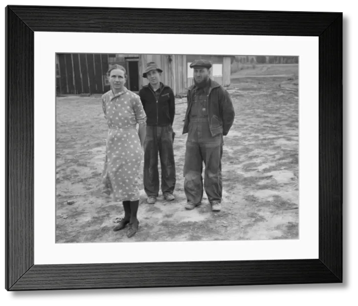 Framed Print : The mother, father, and hardworking fifteen-year-old son in yard... Boundary County, Idaho, 1939. Creator: Dorothea Lange Framed Print : The mother, father, and hardworking fifteen-year-old son in yard... Boundary County, Idaho, 1939. Creator: Dorothea Lange