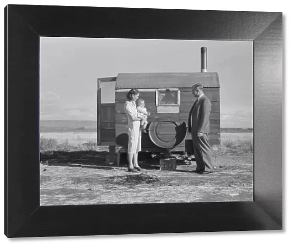 The doctor reassures the mother after having seen the sick... Merrill, Klamath County, Oregon, 1939 Creator: Dorothea Lange