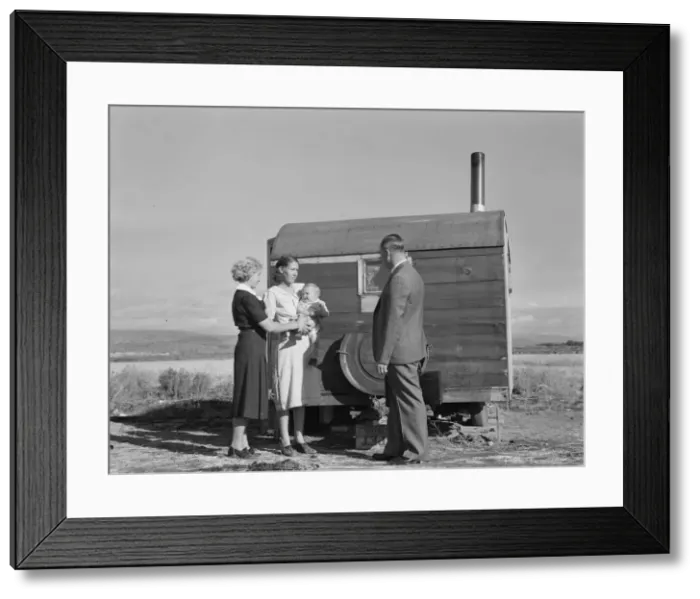 Framed Print : The doctor reassures the mother... the sick baby, Merrill, Klamath County, Oregon, 1939. Creator: Dorothea Lange Framed Print : The doctor reassures the mother... the sick baby, Merrill, Klamath County, Oregon, 1939. Creator: Dorothea Lange