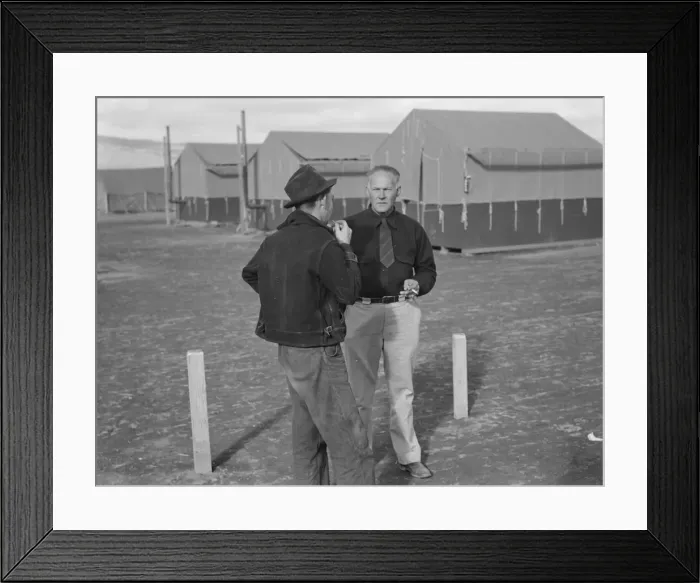 Framed Print : Camp manager talking to another man, FSA mobile camp, Merrill, Klamath County, Oregon, 1939. Creator: Dorothea Lange Framed Print : Camp manager talking to another man, FSA mobile camp, Merrill, Klamath County, Oregon, 1939. Creator: Dorothea Lange