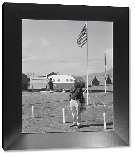 The camp manager at camp entrance, FSA, Merrill, Klamath County, Oregon, 1939. Creator: Dorothea Lange