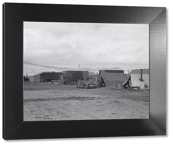 Shows pickers tents, power unit and shower bath... FSA camp, Merrill, Klamath County, Oregon, 1939 Creator: Dorothea Lange