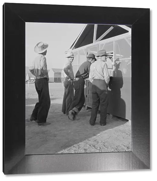 Applicants at registration tent on opening day... FSA camp, Merrill, Klamath County, Oregon, 1939. Creator: Dorothea Lange
