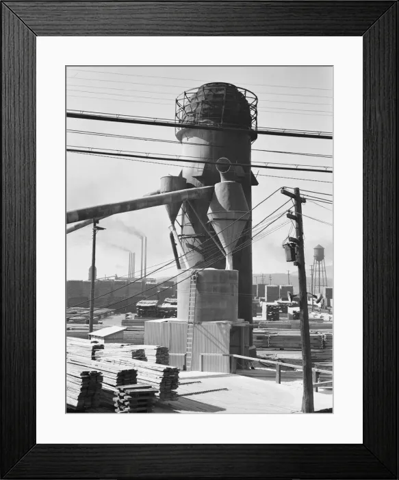Framed Print : Possibly: Lumber burner and stacks of the Big Lakes Lumber Company... Klamath Falls, Oregon, 1939. Creator: Dorothea Lange Framed Print : Possibly: Lumber burner and stacks of the Big Lakes Lumber Company... Klamath Falls, Oregon, 1939. Creator: Dorothea Lange