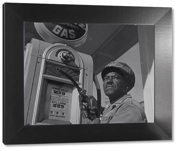 Negro mechanic for the Amoco oil company, Washington, D. C. 1942. Creator: Gordon Parks