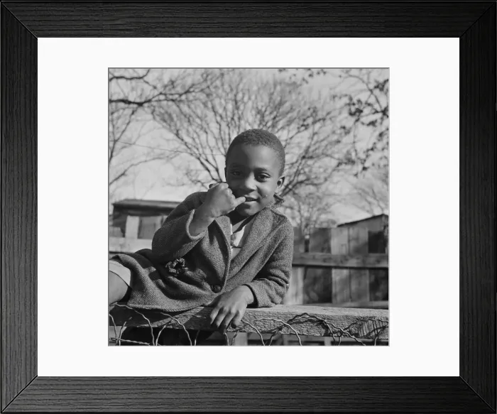 Framed Print : Boy playing on a fence, Washington (southwest section), D. C. 1942. Creator: Gordon Parks Framed Print : Boy playing on a fence, Washington (southwest section), D. C. 1942. Creator: Gordon Parks