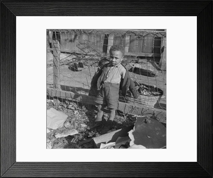 Framed Print : Boy playing in the backyard of his home, Washington (southwest section), D. C. 1942. Creator: Gordon Parks Framed Print : Boy playing in the backyard of his home, Washington (southwest section), D. C. 1942. Creator: Gordon Parks