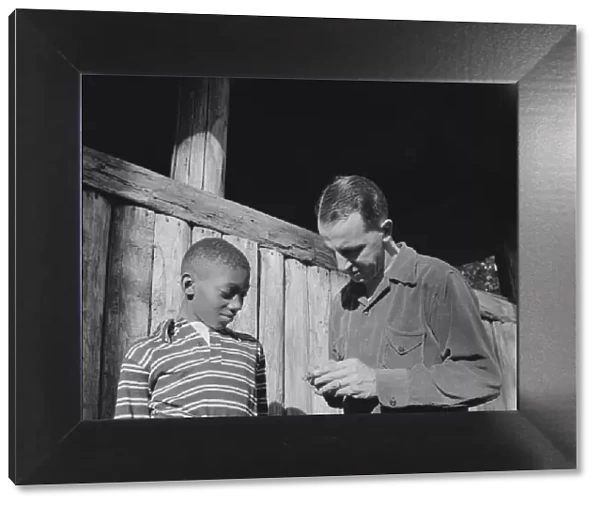 Mr. Lewis Traver, the director, with camper at Camp Nathan Hale, Southfields, New York, 1943 Creator: Gordon Parks