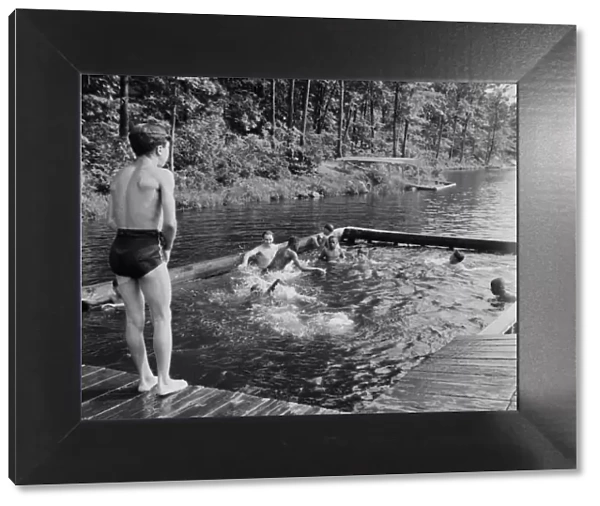 Shallow swimming pool for learners at Camp Nathan Hale, Southfields, New York, 1943 Creator: Gordon Parks