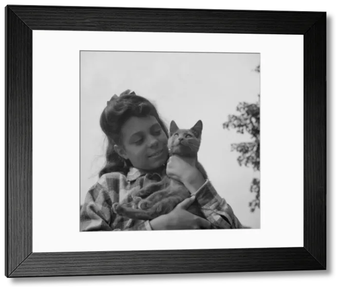 Framed Print : The camp mascot at Camp Gaylord White, Arden, New York, 1943. Creator: Gordon Parks Framed Print : The camp mascot at Camp Gaylord White, Arden, New York, 1943. Creator: Gordon Parks