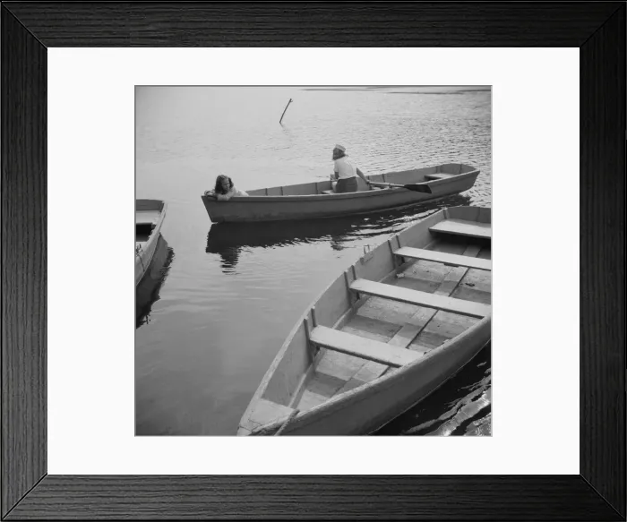 Framed Print : A camper returning a boat to the dock at Camp Gaylord White, Arden, New York, 1943. Creator: Gordon Parks Framed Print : A camper returning a boat to the dock at Camp Gaylord White, Arden, New York, 1943. Creator: Gordon Parks