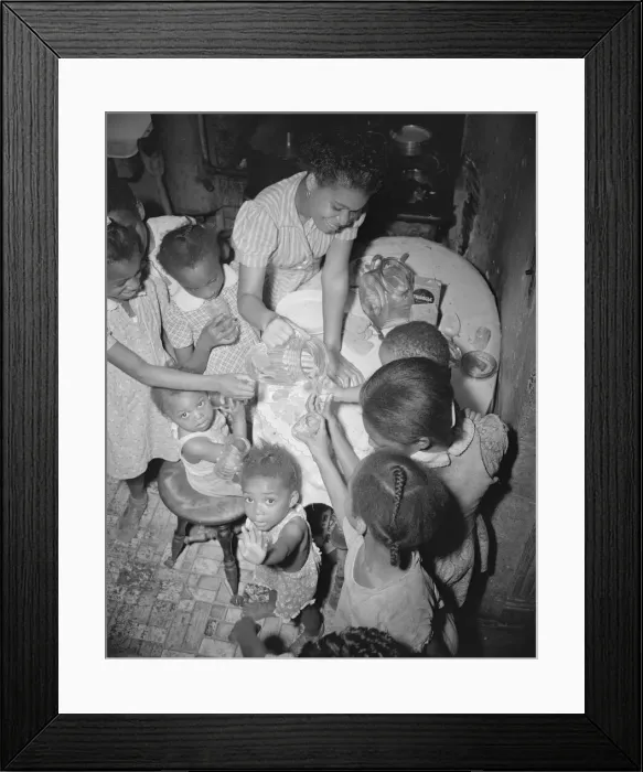 Framed Print : Pouring lemonade at a birthday party on Seaton Road, Washington, D. C. 1942. Creator: Gordon Parks Framed Print : Pouring lemonade at a birthday party on Seaton Road, Washington, D. C. 1942. Creator: Gordon Parks
