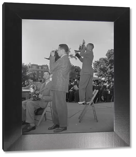 Photographers from the Negro press at Howard University commencement... Washington, D.C, 1942. Creator: Gordon Parks