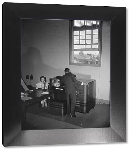 Broadcast tower at Howard University during commencement exercises, Washington, D. C, 1942. Creator: Gordon Parks