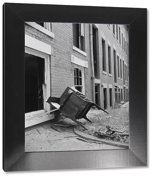 Exteriors of houses being wrecked on Independence Avenue, Washington, D. C, 1942. Creator: Gordon Parks