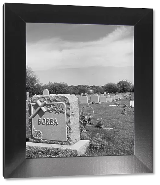 A graveyard at Gloucester which holds the remains of many of the... Gloucester, Massachusetts, 1943 Creator: Gordon Parks