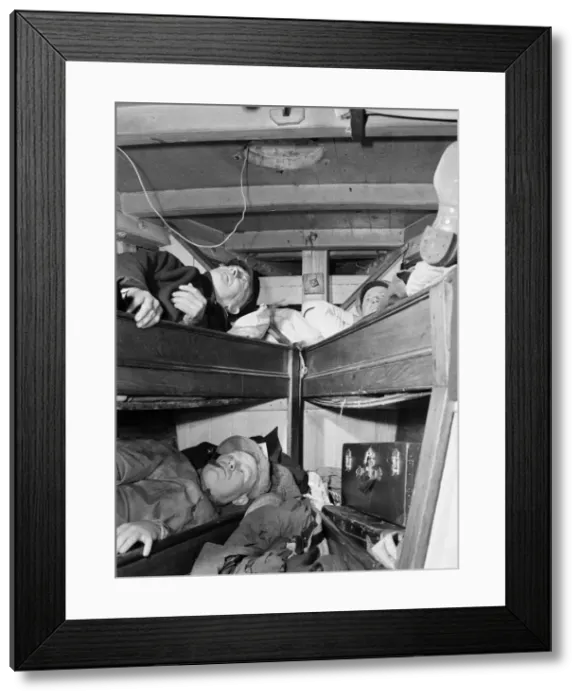 Framed Print : Gloucester fishermen resting in their bunks after unloading their catch at the... New York, 1943. Creator: Gordon Parks Framed Print : Gloucester fishermen resting in their bunks after unloading their catch at the... New York, 1943. Creator: Gordon Parks