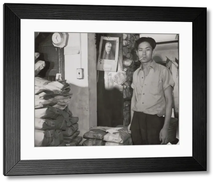 Framed Print : Johnnie Lew, owner of the laundry under the apartment of Mrs. Ella... Washington, D.C. 1942. Creator: Gordon Parks Framed Print : Johnnie Lew, owner of the laundry under the apartment of Mrs. Ella... Washington, D.C. 1942. Creator: Gordon Parks