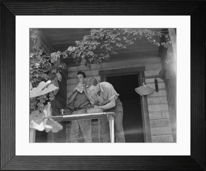 Framed Print : Hop farmers sons, washing for noon meal on back porch, Independence, Polk County, Oregon, 1939. Creator: Dorothea Lange Framed Print : Hop farmers sons, washing for noon meal on back porch, Independence, Polk County, Oregon, 1939. Creator: Dorothea Lange
